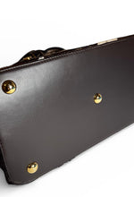 Load image into Gallery viewer, Brown leather handbag with gold studs on a white background
