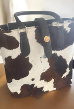 Load image into Gallery viewer, Tote bag with cow print pattern on a wooden surface
