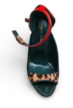 Load image into Gallery viewer, Black high-heeled shoe with red ankle strap and leopard print insole on a white background
